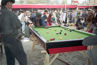 58 Kashgar Sunday Market 1993 Playing Pool In Fruit And Vegetable Market.jpg